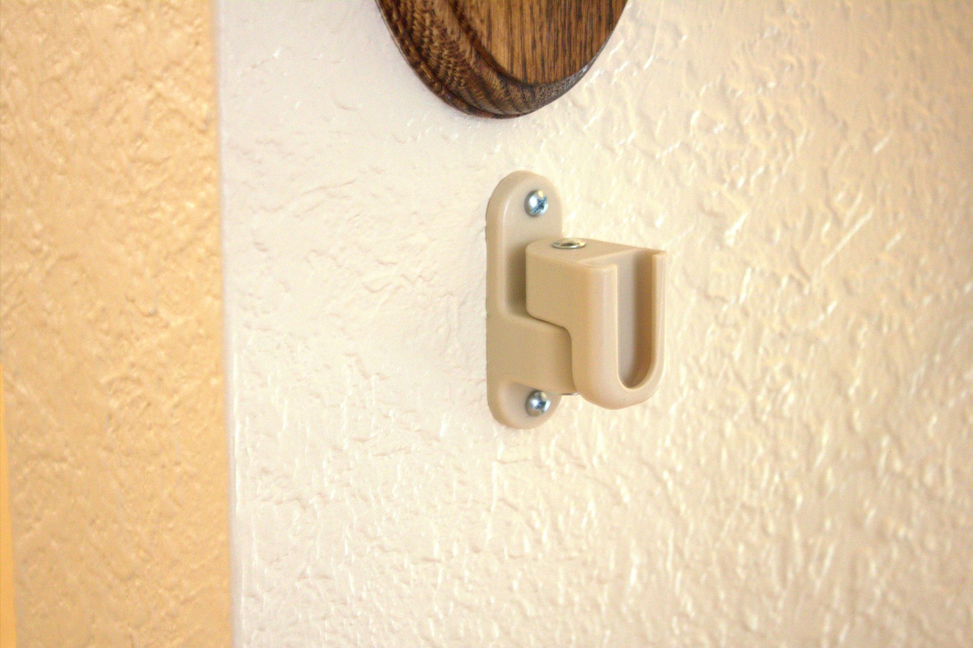 The Baby Gate Hinge Located At The Top Of The Stairs
