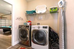 The laundry room has a brand new mega capacity washer and dryer for your use
